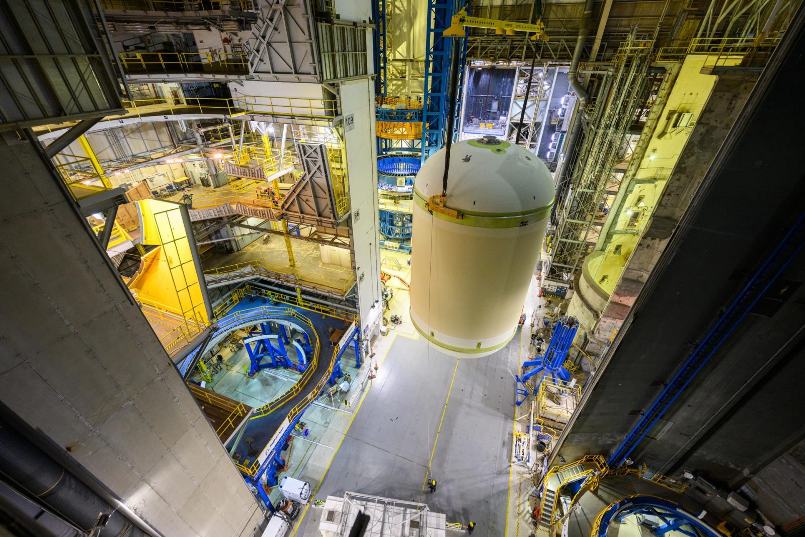 Teams at NASA’s Michoud Assembly Facility in New Orleans lift a liquid oxygen tank from a horizontal to a vertical position and place it into a production cell on July 12.